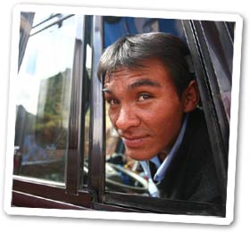 Our bus driver Jose Luis patiently waits for the team to check out road stand attractions.