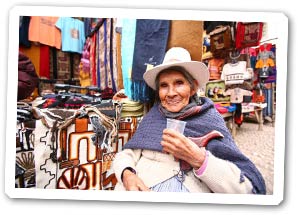 This 86-year old resident of Pesac quitely tends to her small stall of textiles, blankets, and hats.